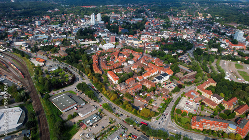 Fototapeta Naklejka Na Ścianę i Meble -  Aerial panorama view above the old town of the city Itzehoe in Germany on a sunny afternoon in spring	