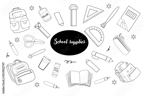 Variety of school supplies for back to school design.