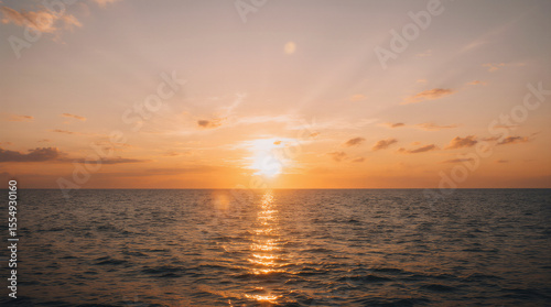 Awesome sunset and soft pink clouds of pastel tones. Image template of textured sky. Gorgeous photo wallpaper. Bright epic sky. Dramatic evening light and fiery orange sunset. Beauty of earth.
