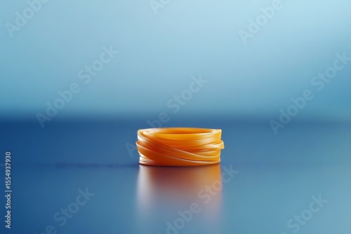 Amber Ring on Blue Surface