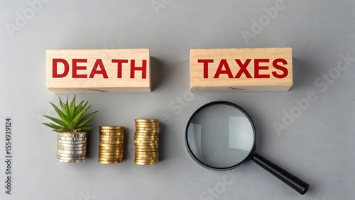 Death taxes concept. Wooden blocks with inscription and coins. Taxes that are applied when someone dies, usually on the money or property they leave behind. 