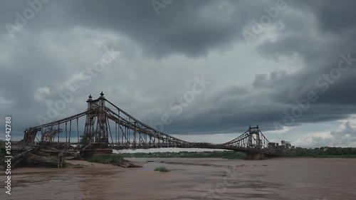 Dramatic Storm Clouds Over the Ruined Long Bien Bridge in Hanoi Vietnam