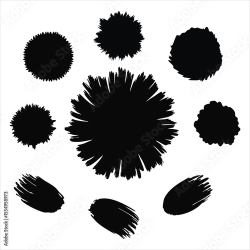 Collection of abstract black ink splatters and brush strokes with spiky edges and organic shapes isolated on a white background. Ideal for use in grunge-style branding, abstract art, graphic design