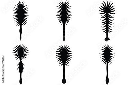 Set of six black silhouettes of stylized dandelion seed heads on white background