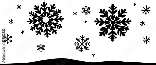 falling snowflake silhouettes over landscape