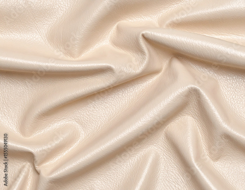 Cream patent leather with glossy draped surface texture