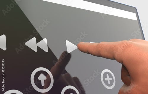 User's finger touching a play button on a digital device's screen