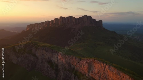 Drone view of national park Bolshoy Tkhach in Caucasus mountains with sunset tones
