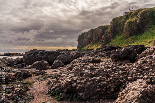 The beach and cliffs in Auchmithie, Scotland, UK