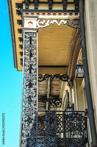 front view, medium distance of, black, wrought Iron railing, on a front porch in Savannah, GA.