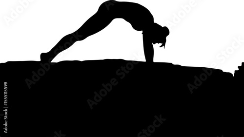 silhouette of a woman doing yoga