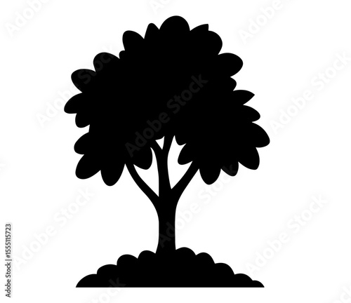 Silhouette of Tree with Lush Canopy Standing on Small Hill