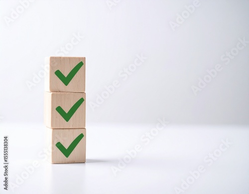 Vertical Stack of Wooden Blocks with Green Checkmarks: Success and Completion