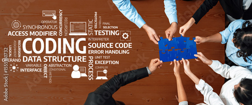 A diverse team collaborates on a coding challenge, piecing together a puzzle that symbolizes problem-solving in software development and programming. Amity