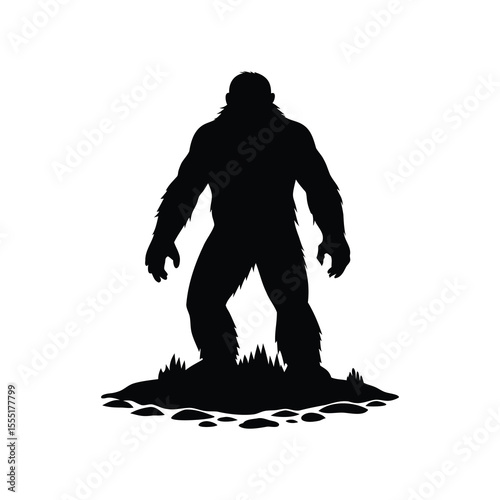 Silhouette of a Bigfoot or Sasquatch Standing on Grassy Land