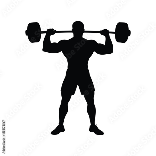 Silhouette of muscular man lifting heavy barbell demonstrating strength and power