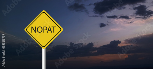 Yellow transport sign with the word NOPAT (abbreviation for net operating profit after tax) on a blue sky background