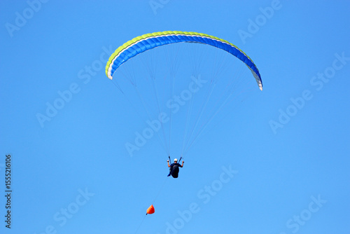Paraglider being towed by a winch	