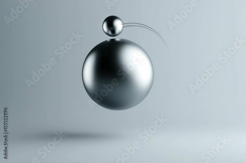 Abstract metallic spheres floating in a minimalist design, ideal for modern backgrounds and digital media.