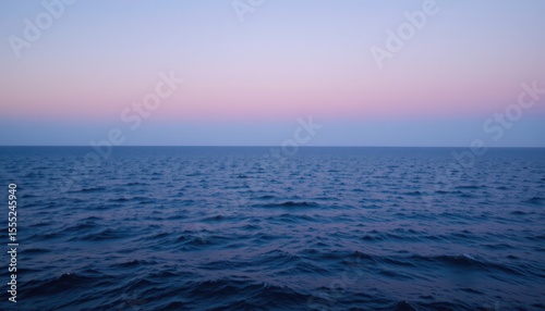blue background of an evening calm on the baltic sea, optimize with ample copy space for photo use, clear and focused positioning of the subject at the top.