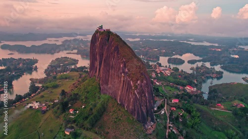 Aerial view of La Piedra del Peñol monolith and lake at sunset – Guatapé, Medellín, Colombia