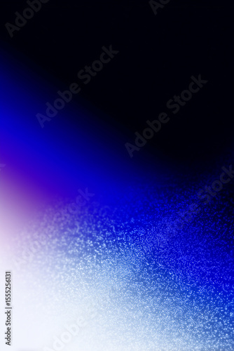 Abstract Blue Light Gradient with Sparkling Particle Dust on Smooth Dark Background