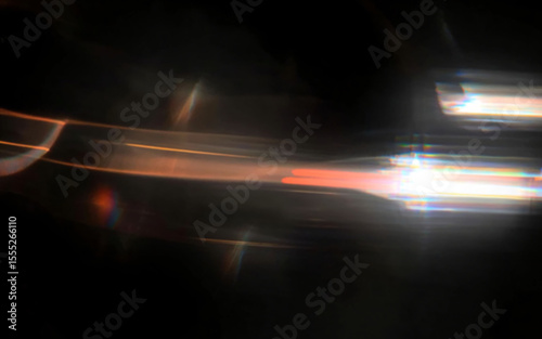 Light streaks with chromatic aberration dynamically cut across a dark background