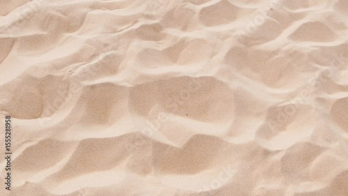 Close up of rippled sand creates a textured beach background video