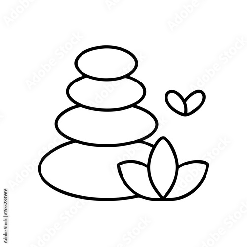 Stacked spa stones with leaves representing relaxation and beauty