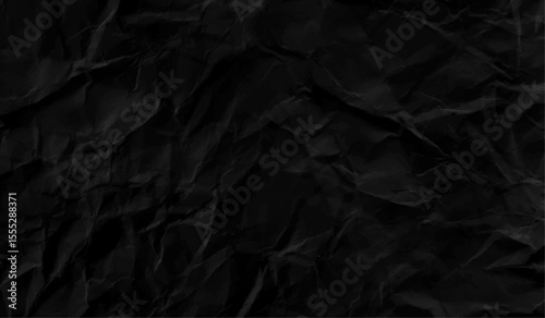 crumpled black paper texture background.  From above black crumpled paper texture. Black crumpled background.