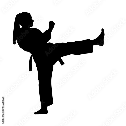 Silhouette of a woman practicing karate kick without background  