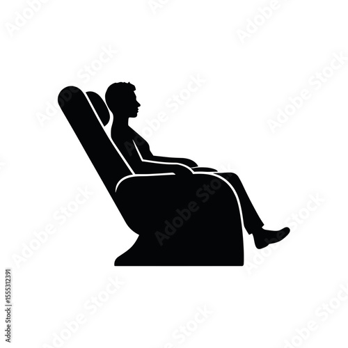 Silhouette of a person relaxing in a massage chair at the airport  