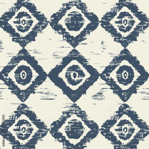 Vibrant blue and white hues come together to form a pattern featuring intricate geometric shapes