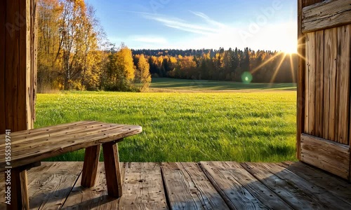 Wooden porch overlooks sunny meadow landscape view