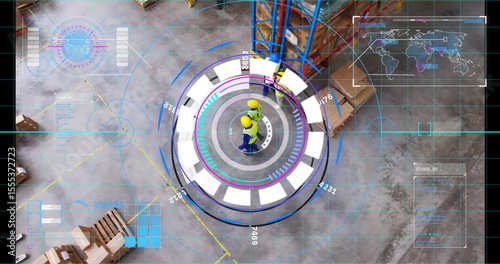 Monitoring two workers wearing yellow hard hats using holographic interface at warehouse with racks