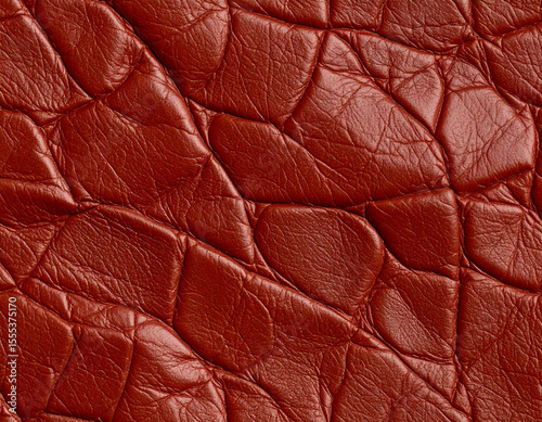 Red brown cracked grain leather texture closeup