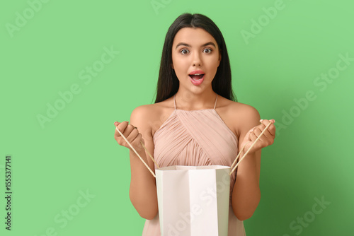 Shocked beautiful young wom...