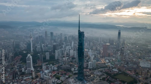 Wallpaper Mural Aerial view time lapse 4k video of Kuala Lumpur city center view during dawn overlooking the city skyline in Federal Territory, Malaysia.  Torontodigital.ca