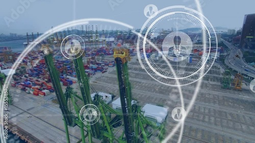 HUD graphics fading in over port cranes, rotating while linking containers and visualizing network