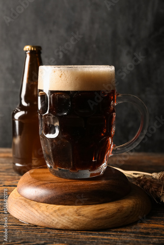 Mug and bottle of cold dark...