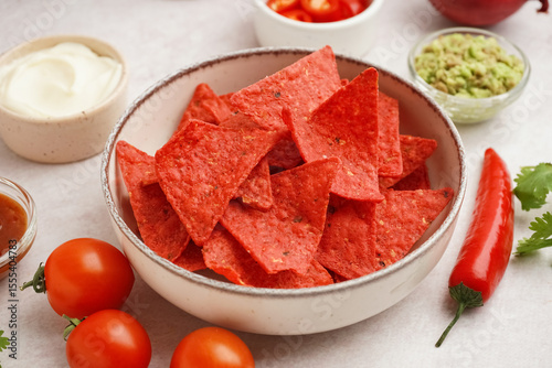 Spicy red tortilla chips in...