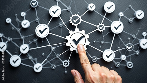 A hand activating a gear within a network of checkmark icons. A concept representing quality assurance, process standardization, system validation, and business workflow management.