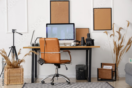 Stylish workplace with mode...