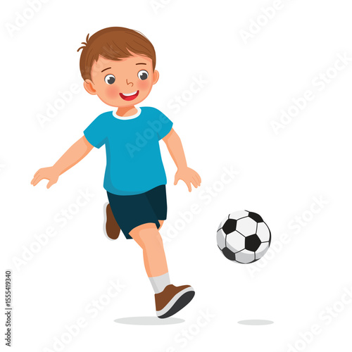 Little boy playing soccer football kicking the ball