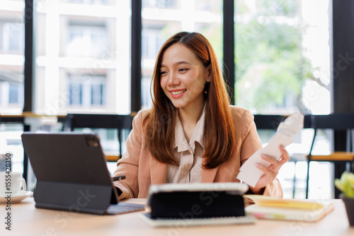 Family financial plan. Finance investment on real estate. Family invest in insurance save plan. woman is putting coins into a bank. Concept of saving money and being financially responsible.
