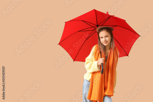 Cute teenage girl with red ...