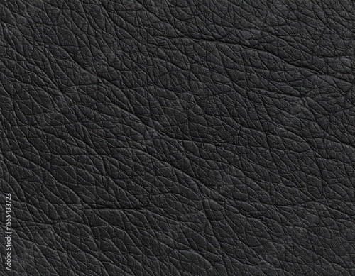 Detailed black leather surface with natural grain