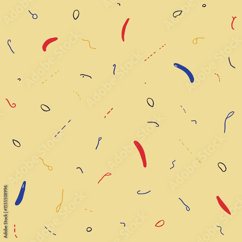A colorful array of paper shreds, with a light-colored background.