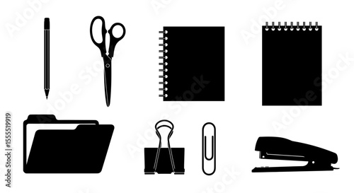 Office supplies arrangement featuring a pen, scissors, notebooks, and various stationery items neatly placed
