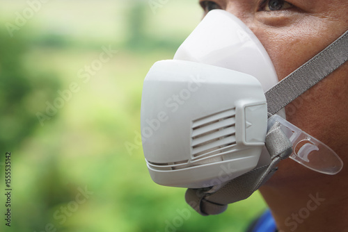 Photography Close-up of protective face mask used by farmer during pesticide or chemical spraying